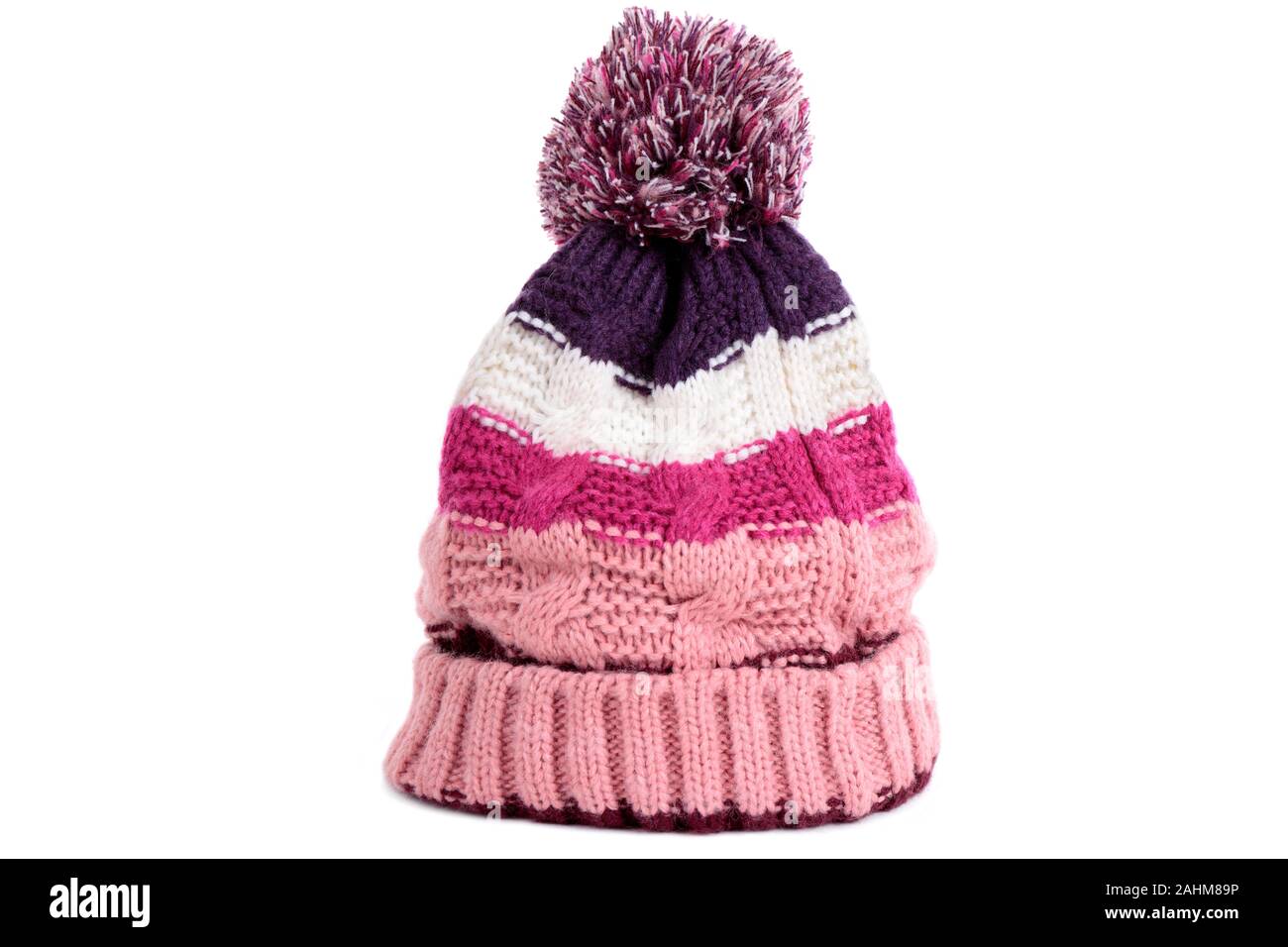 Pink winter bobble ski hat Stock Photo