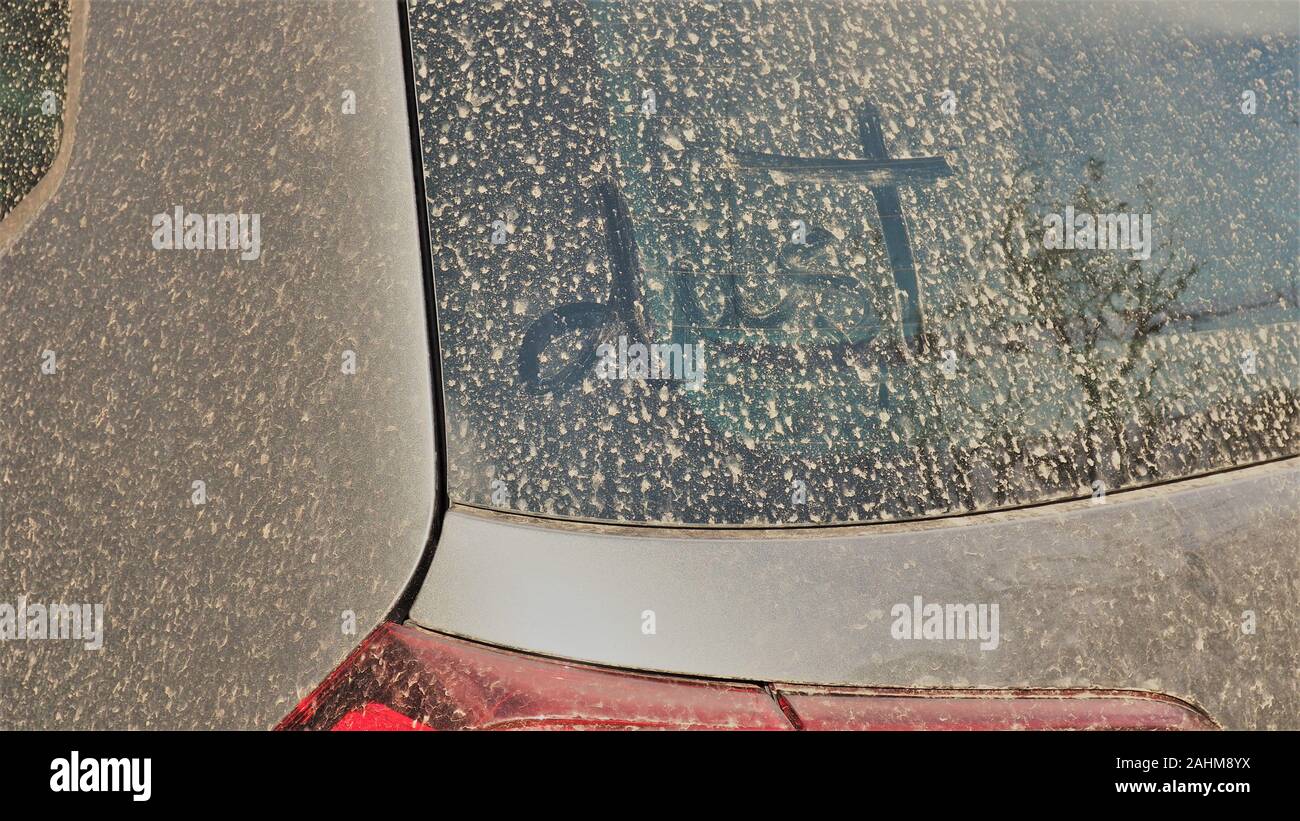 Hand written word in dust on car hires stock photography and images