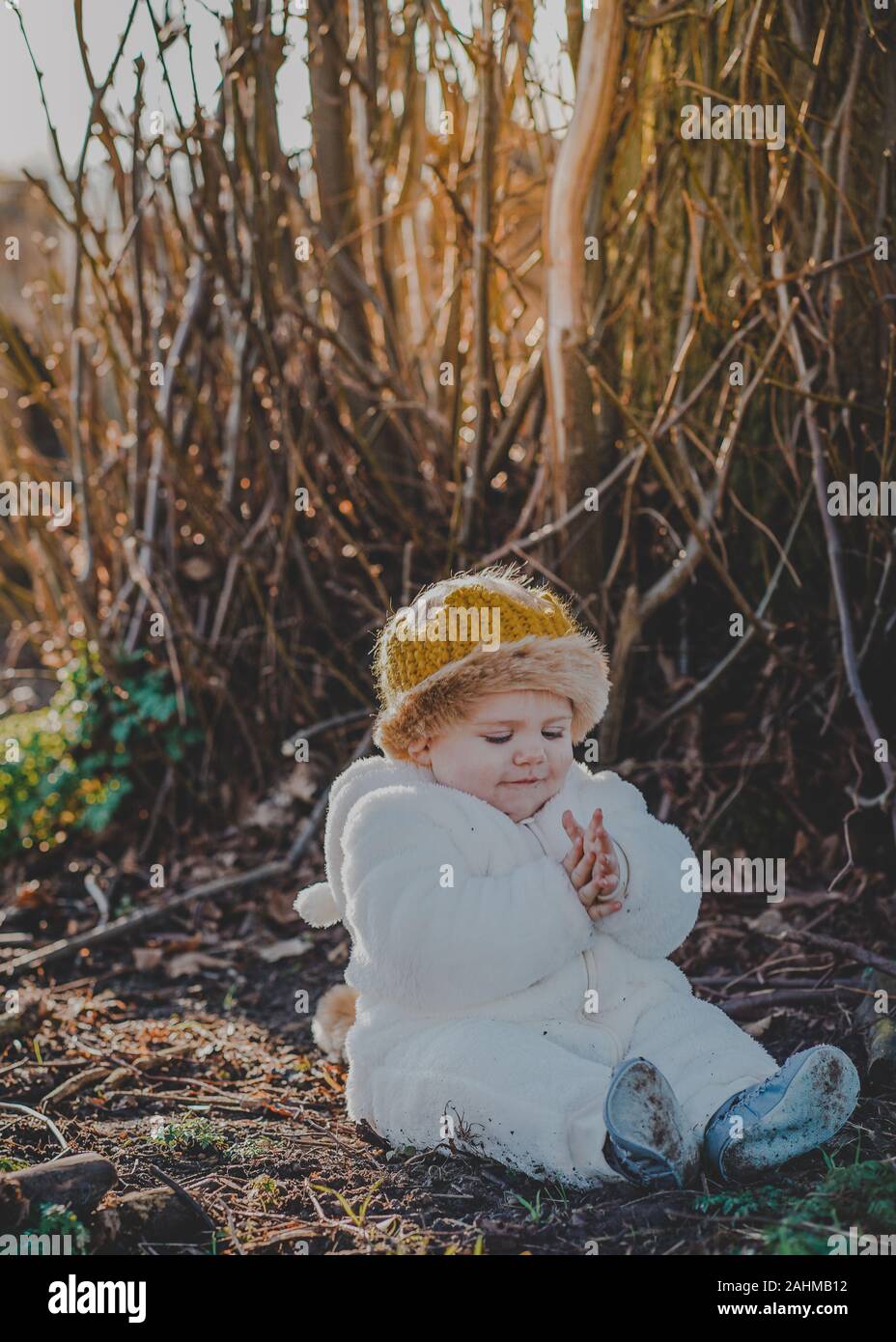 Little boy dressed as Max from Where The Wild Things Are in the woods Stock Photo