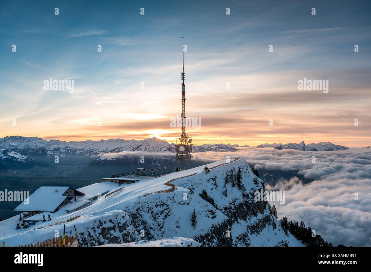 sea of fog in front of Mount Niesen at a winter sunset seen from Niederhorn Stock Photo
