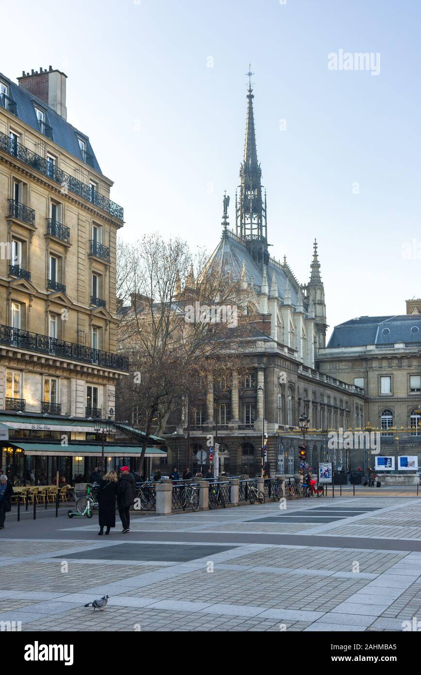 Sainte Chapelle viewed from Place Louis Lépine with people walking, Paris, France Stock Photo