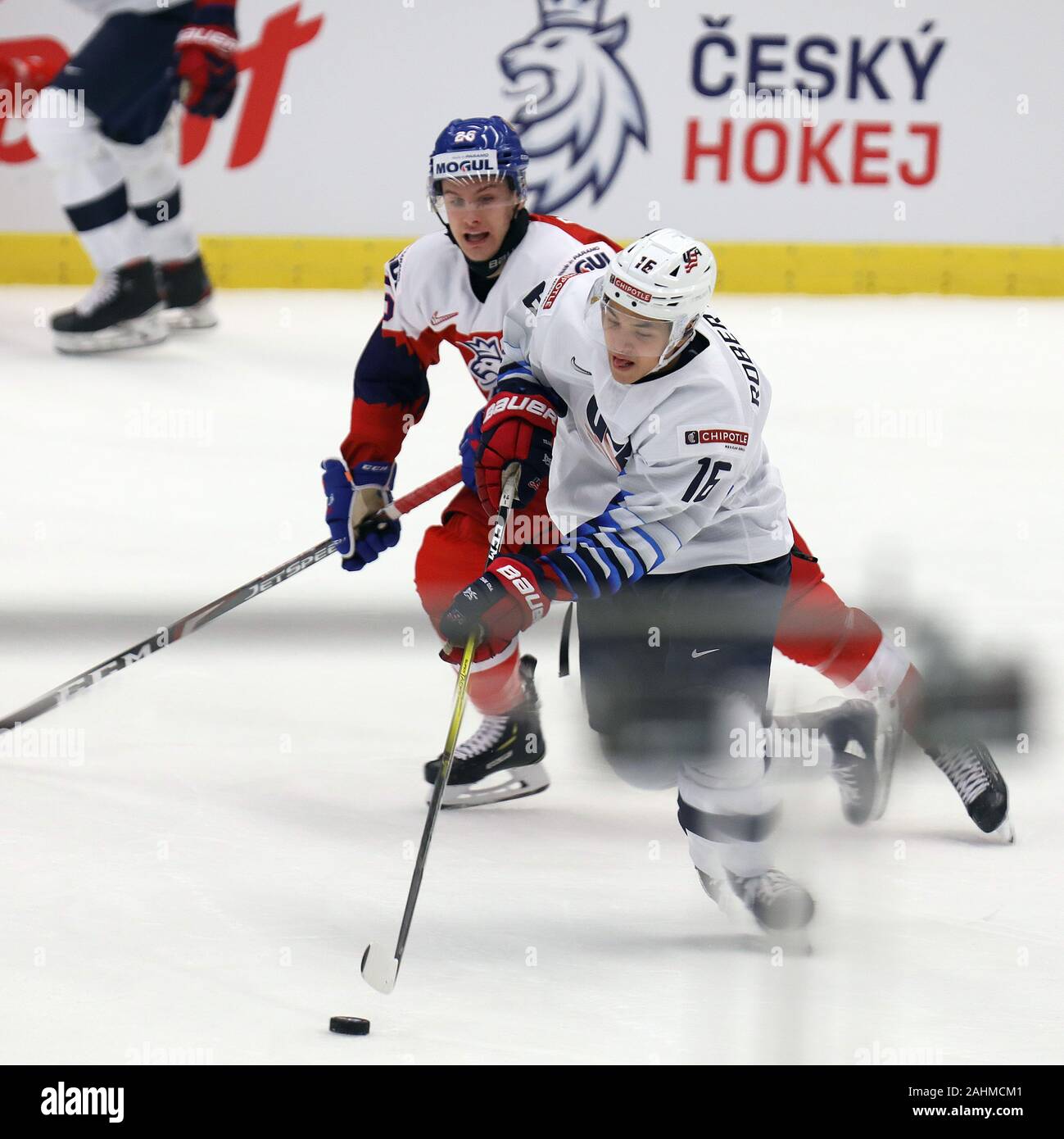 L-R Adam Raska (CZE) and Nick Robertson (USA) in action during the 2020 IIHF World Junior Ice Hockey Championships Group B match between USA and Czech Stock Photo