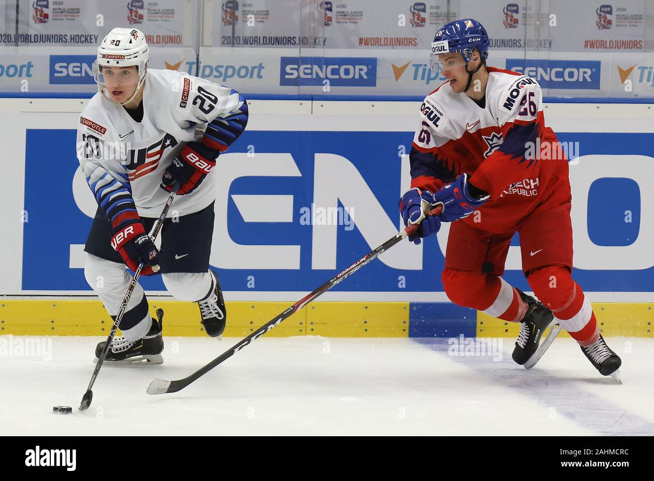 L-R Parker Ford (USA) and Adam Raska (CZE) in action during the 2020 IIHF World Junior Ice Hockey Championships Group B match between USA and Czech Re Stock Photo