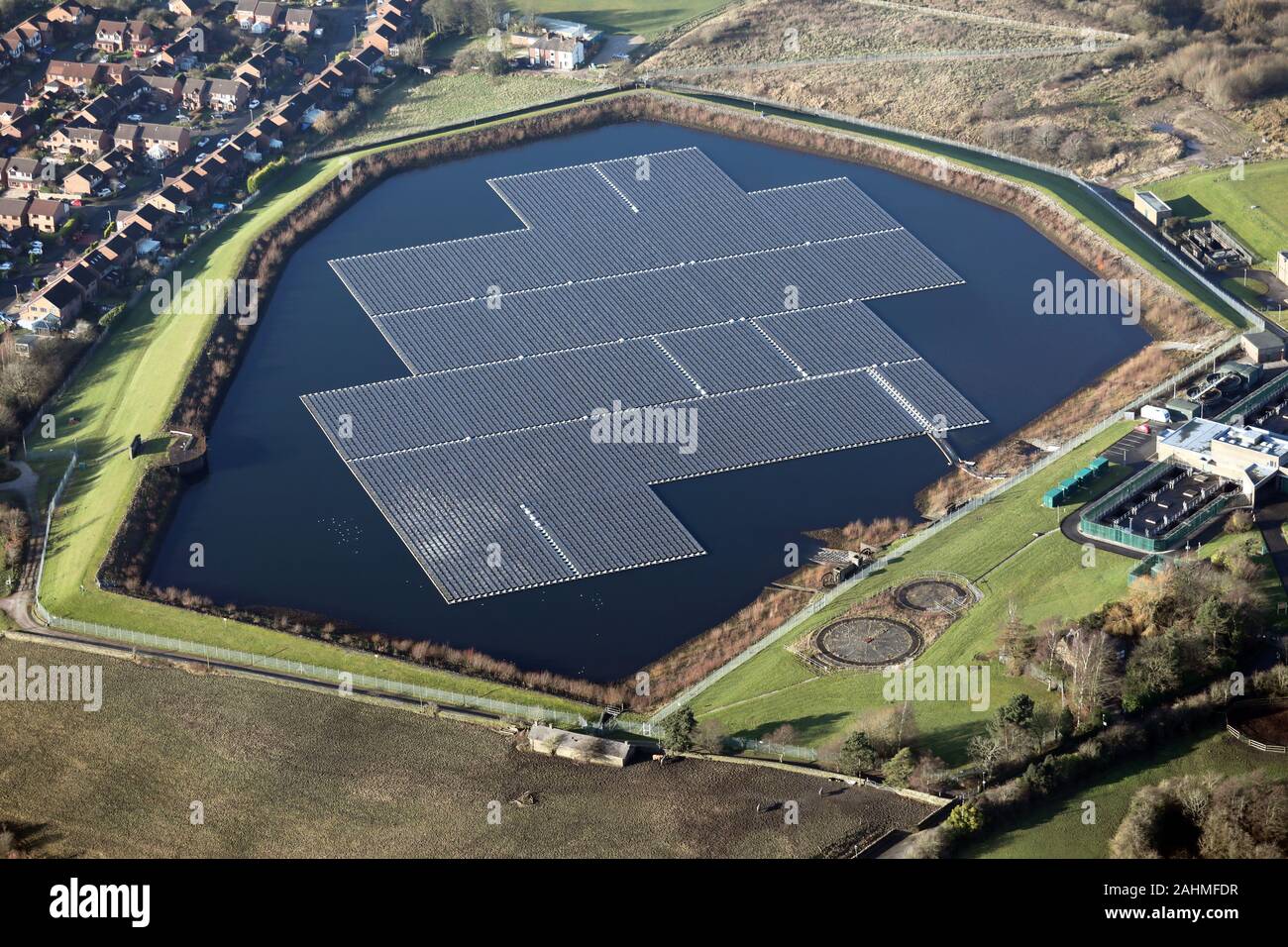 aerial view of a solar farm floating on Godley Reservoir, near Hyde, Cheshire Stock Photo