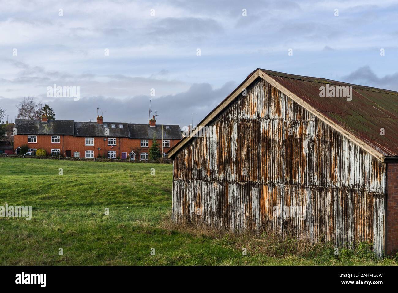 Weathered corrugated iron barn on the outskirts of the village of
