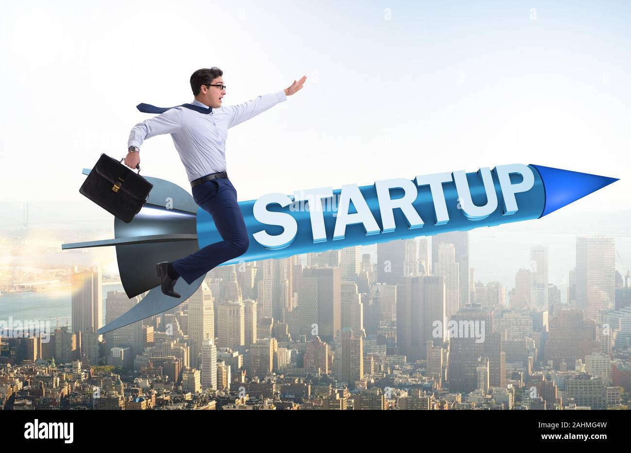 The businessman in start-up concept flying on rocket Stock Photo - Alamy