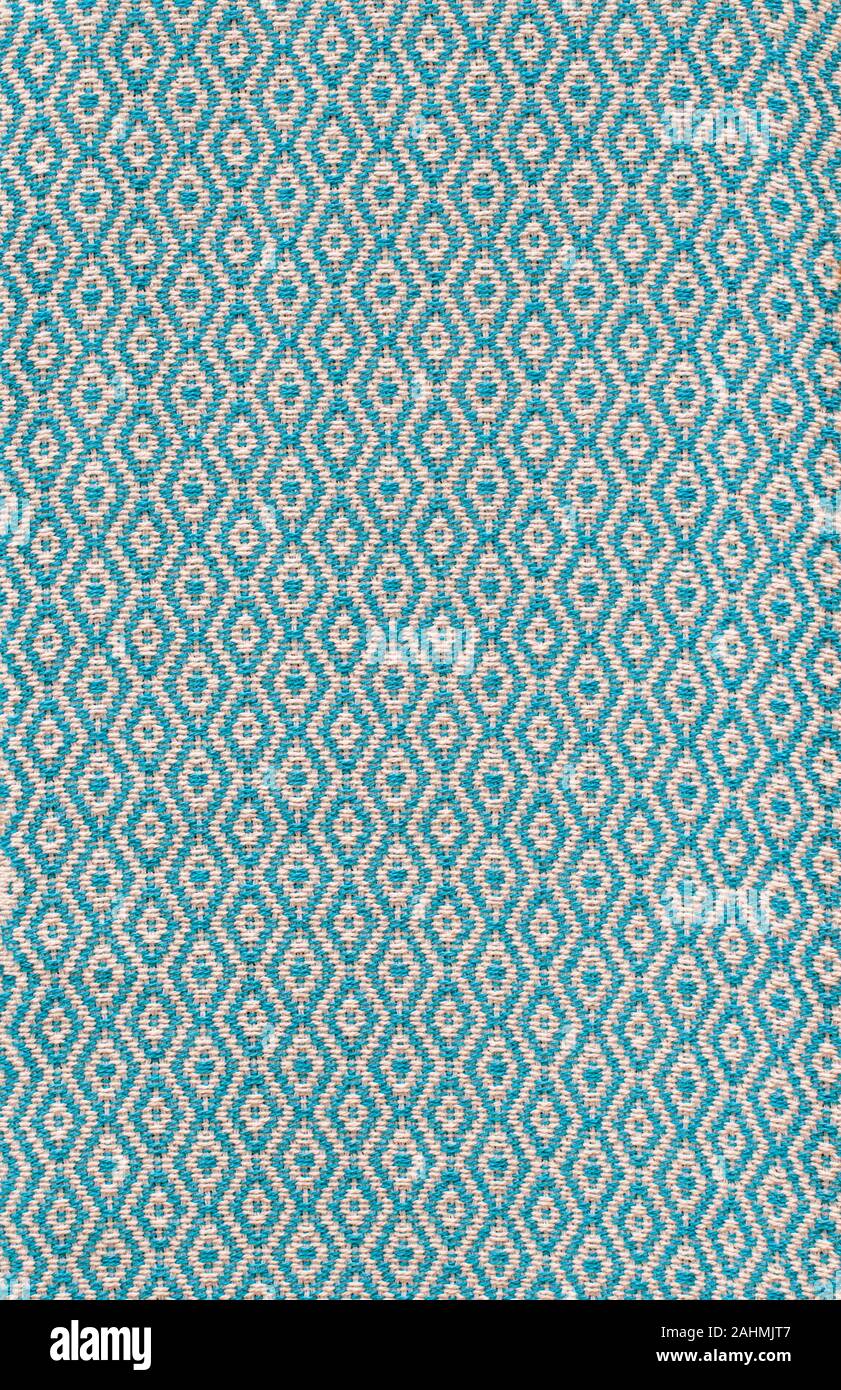 Closeup of woven mesh textile background with even spaced warp and woof threads Stock Photo