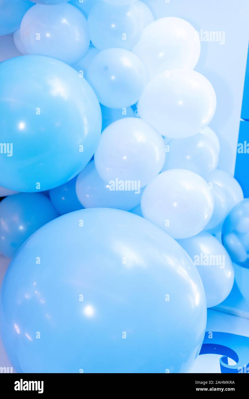 Birthday decorations with pastel balloons on white background Stock Photo -  Alamy