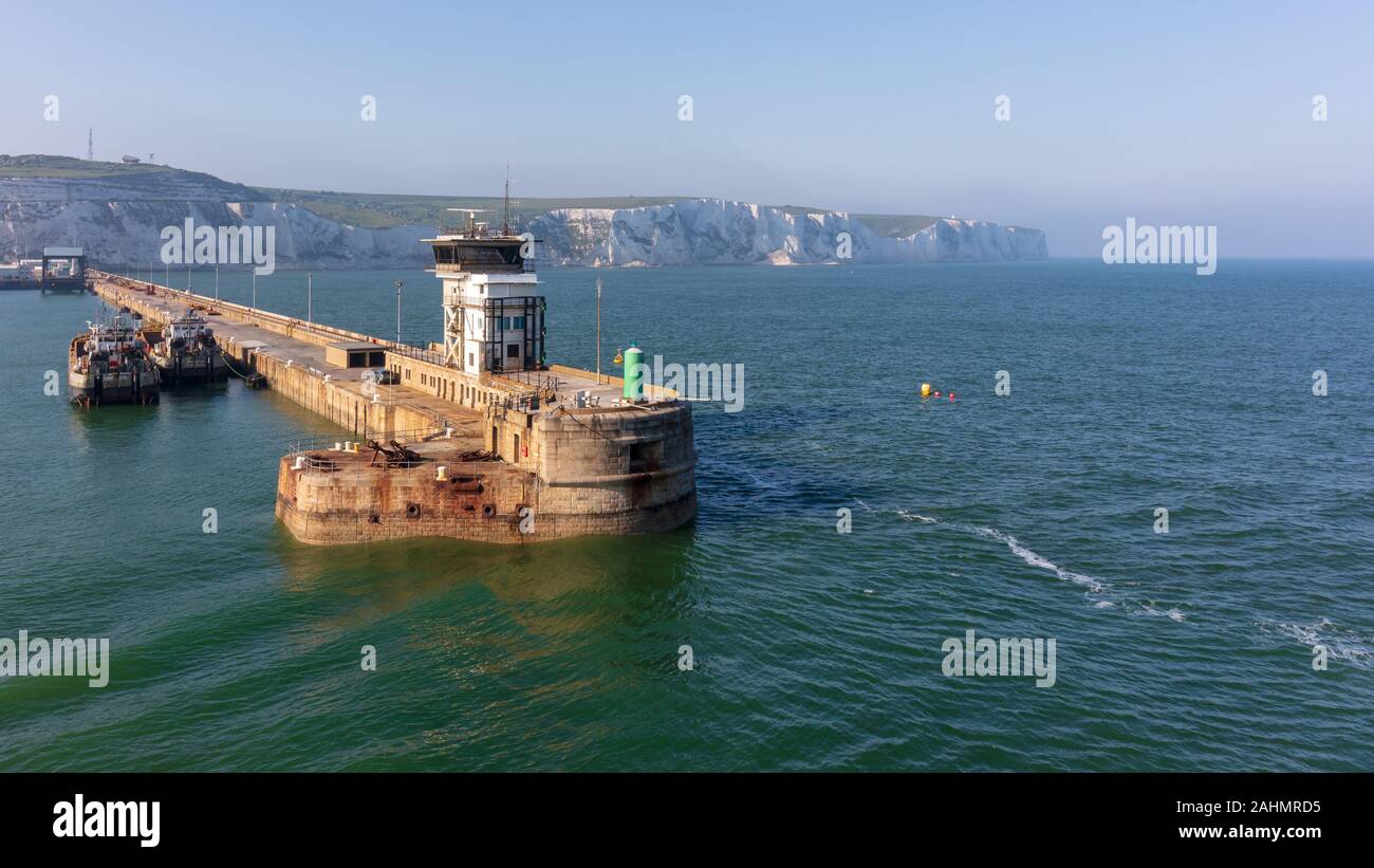 Dover, UK; 20th May 2018; White Cliffs of Dover Visible Behind Harbour Arm Stock Photo