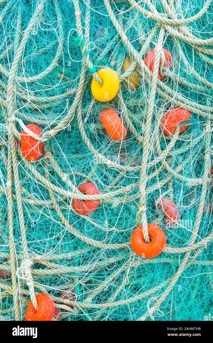 fishing net with colorful floats Stock Photo