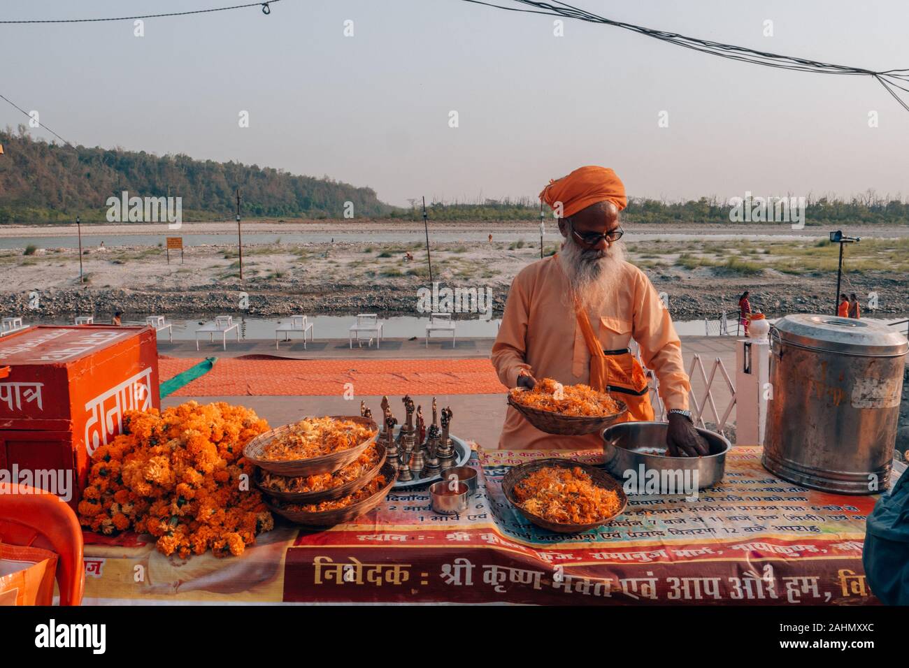 Hinduist Monks in India in colorful orange clothes Stock Photo