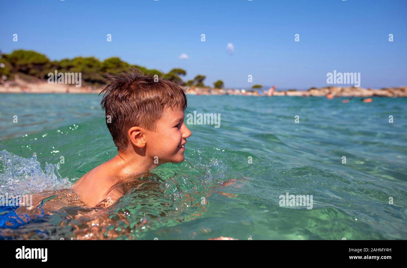 Little boy swimming in sea at Greece on summer Stock Photo Alamy