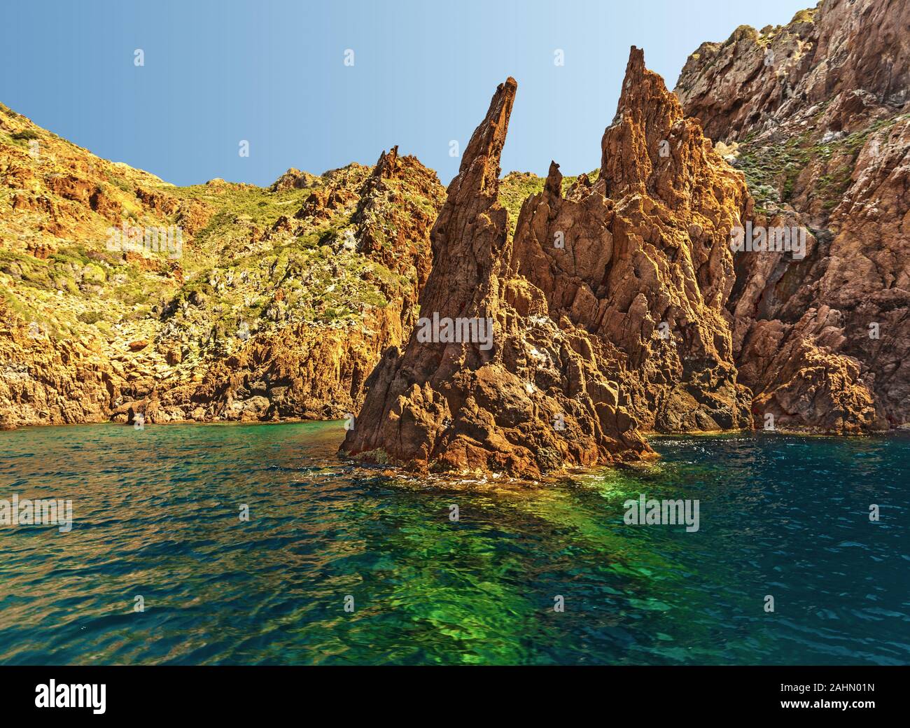 Red rhyolite clifs of Scandola Nature reserve, Corsica Island, Corse-du-Sud, France Stock Photo