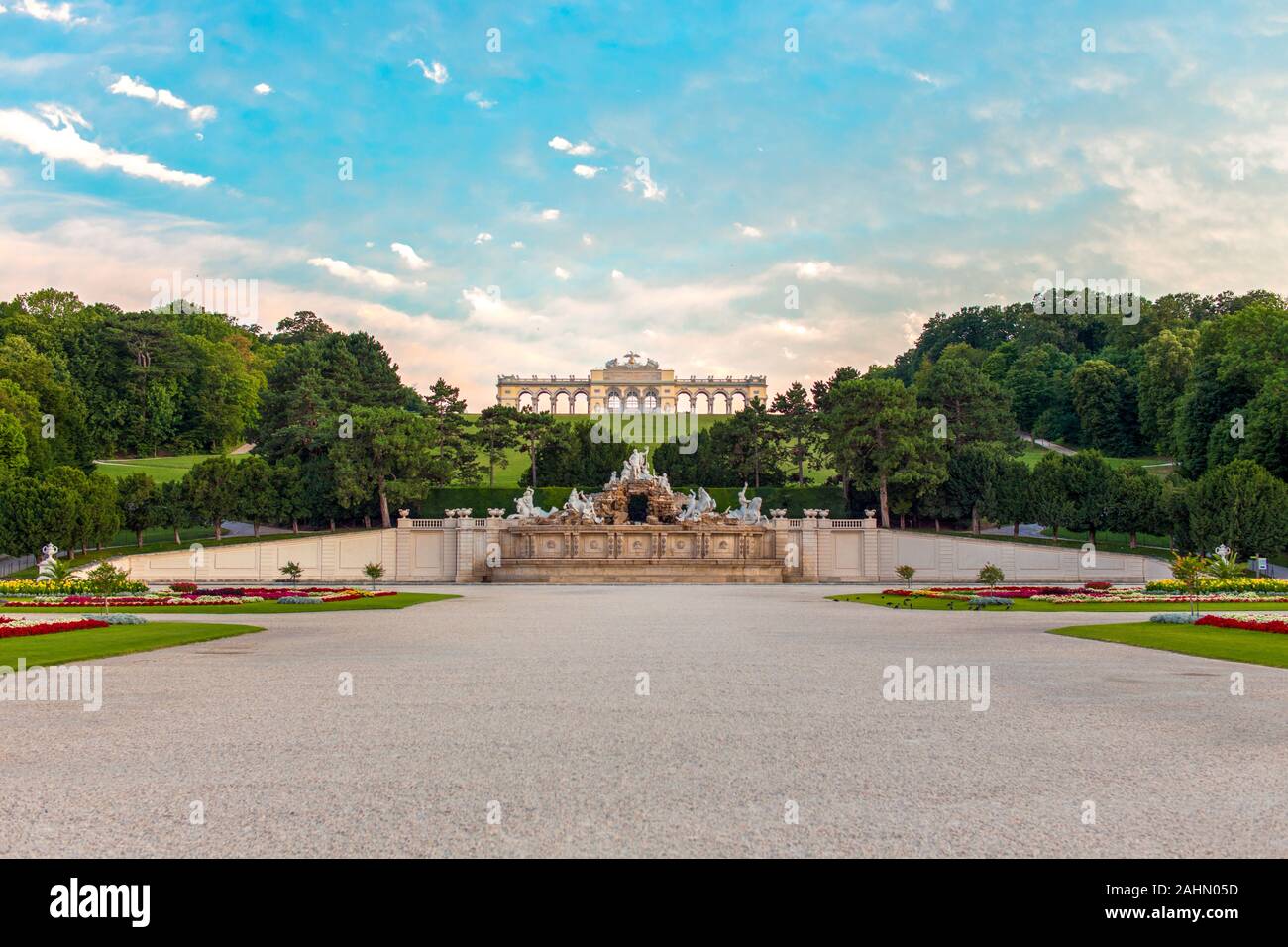 Schönbrunn Palace Gloriette, the Neptune Fountain and Great Parterre in Vienna, Austria Stock Photo