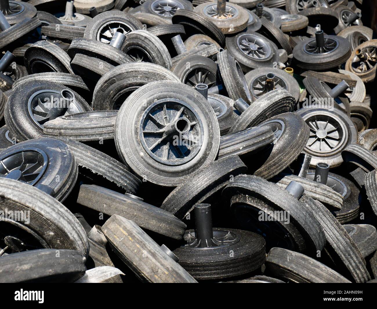 Wien/Austria - june 4 2019: close up of a group of replaced plastic wheels of waste containers for the waste management system of the city Stock Photo