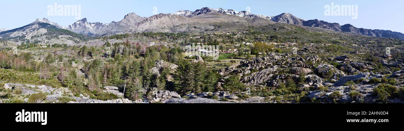Panorama of Niolo region in Central Corsica Dominated by Monte Cinto mountain chain, Albertasse village and farms mixed with rocky and forest landscap Stock Photo
