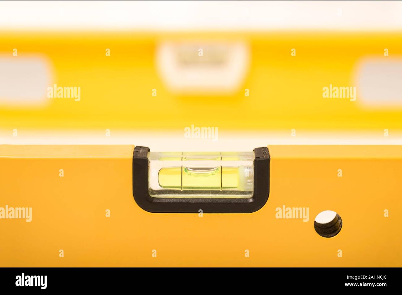 Close up of a spirit level, used to ensure a surface is horizontal or