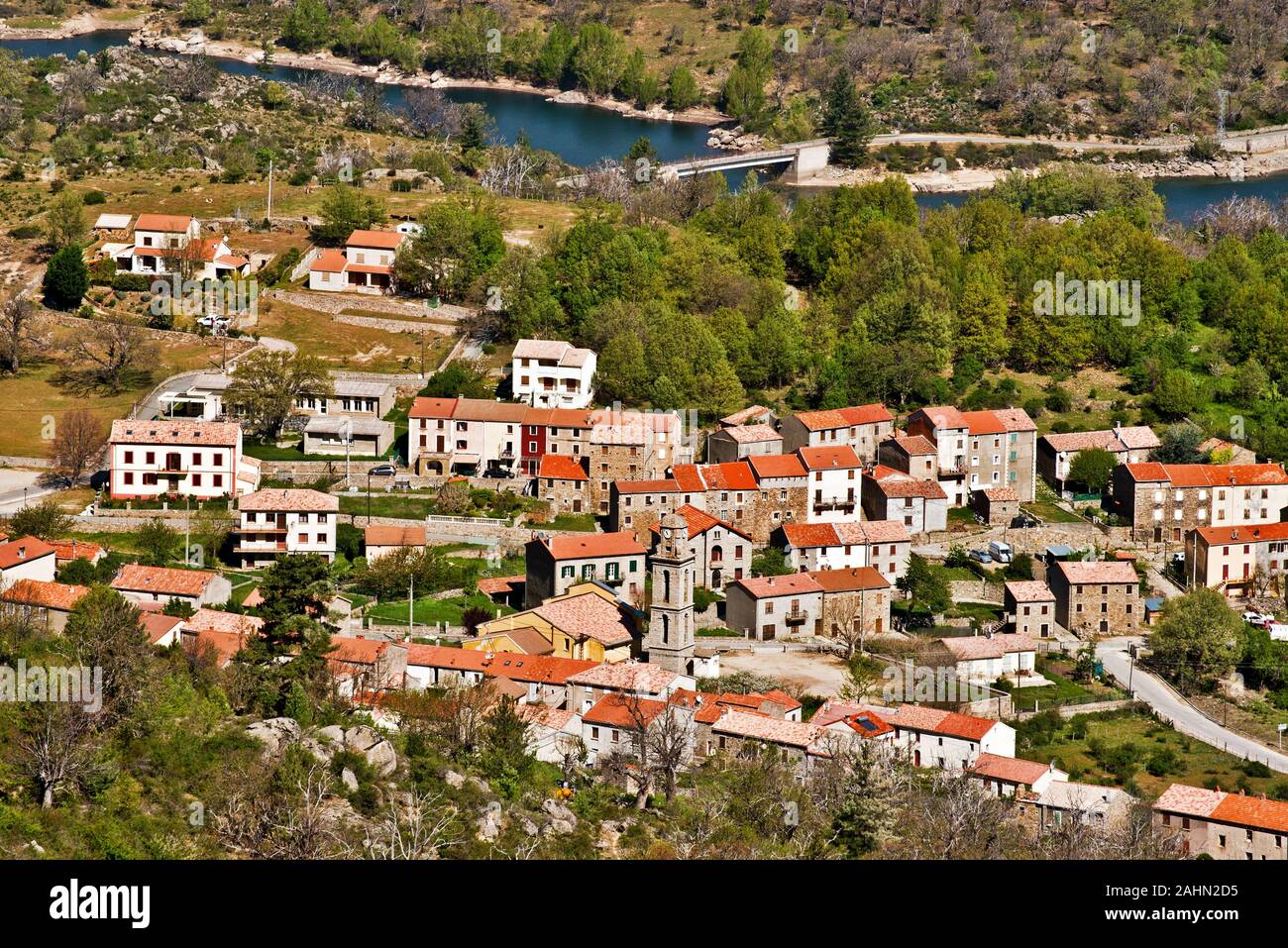 Casamaccioli village in Central Corsica , the flow of Golo river joining Calacuccia Lake is the next by. Niolu, Haute-Corse, France Stock Photo