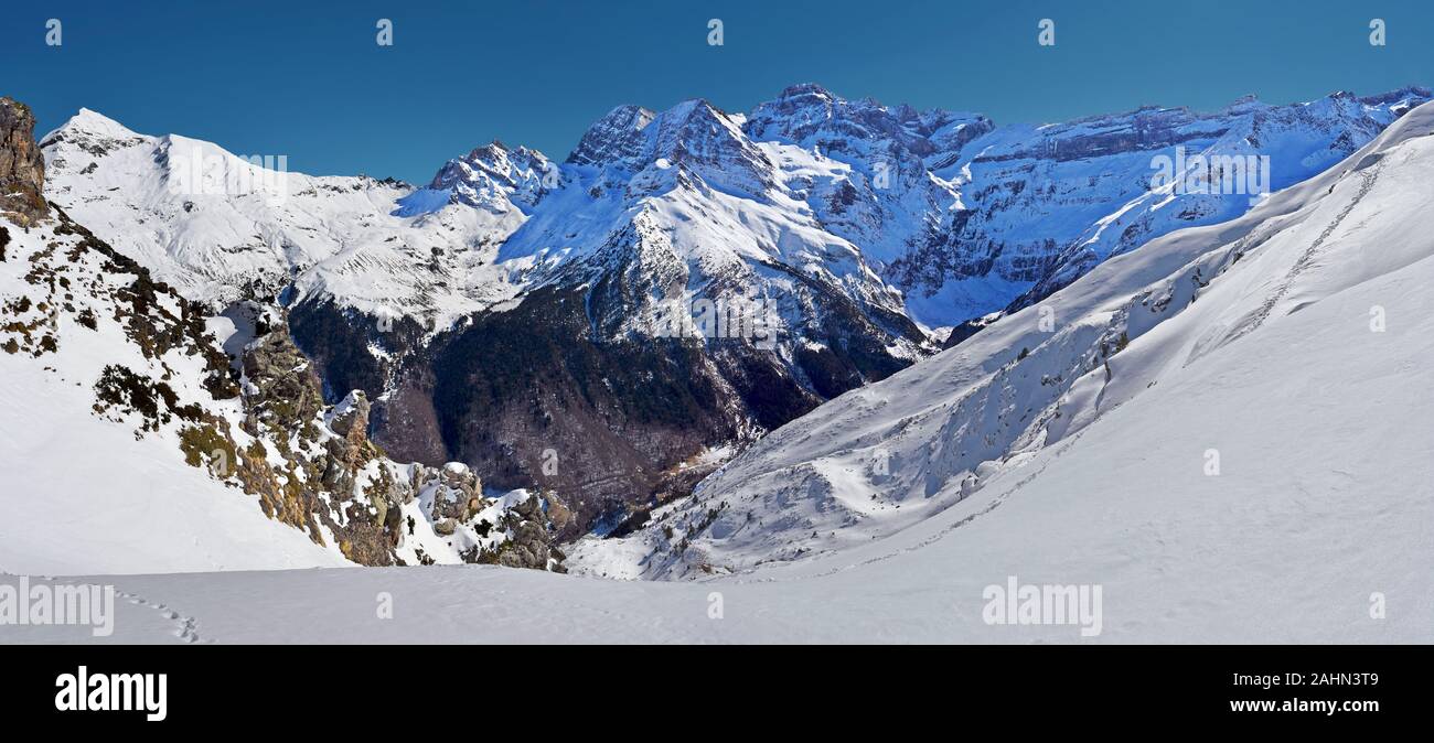 Winter Panorama of Cirque de Gavarnie seen from Pahule Pic in Pyrenees Mountains, Cascade pics are at right background, Hautes-Pyrenees, France Stock Photo
