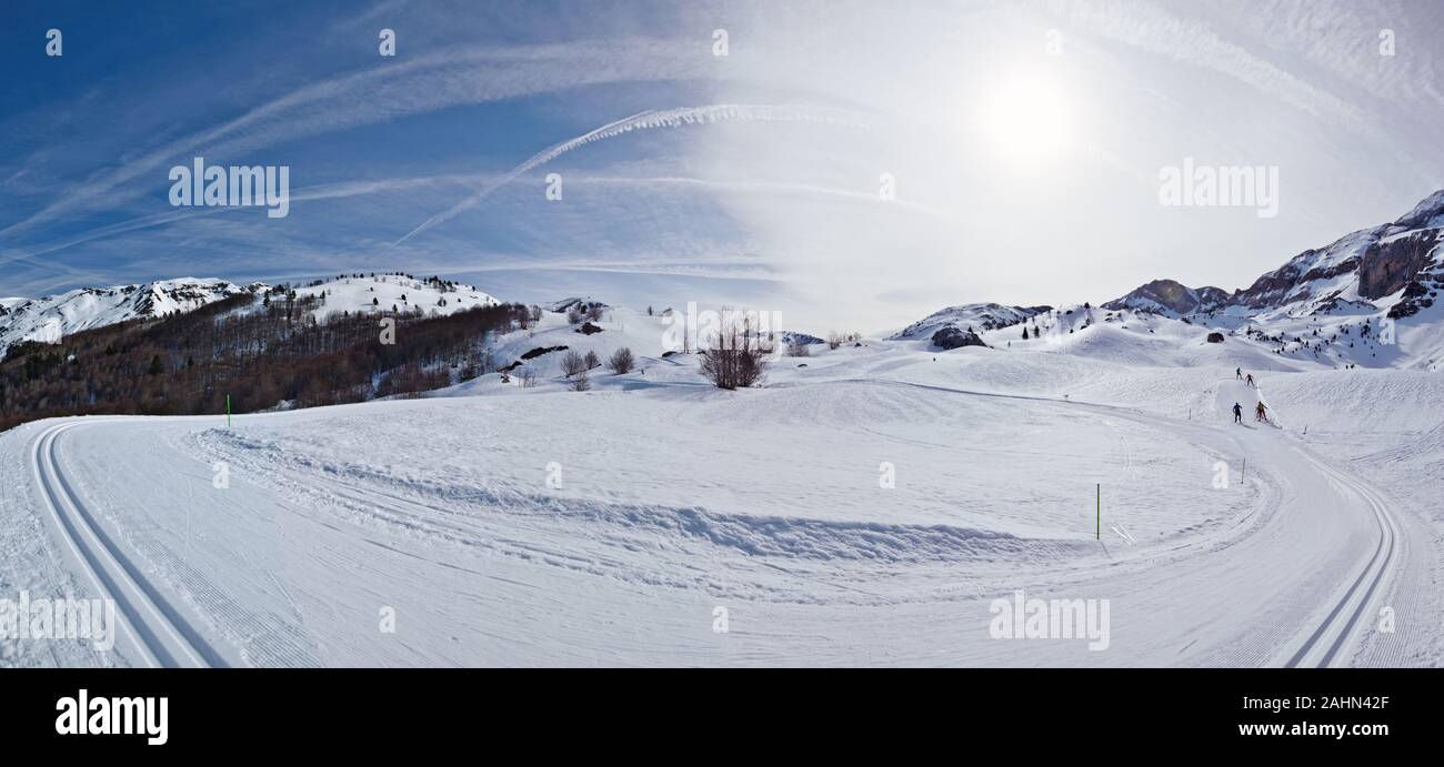 Panorama of Winter Pyrenees Mountains at Somport ski resort with cross ...