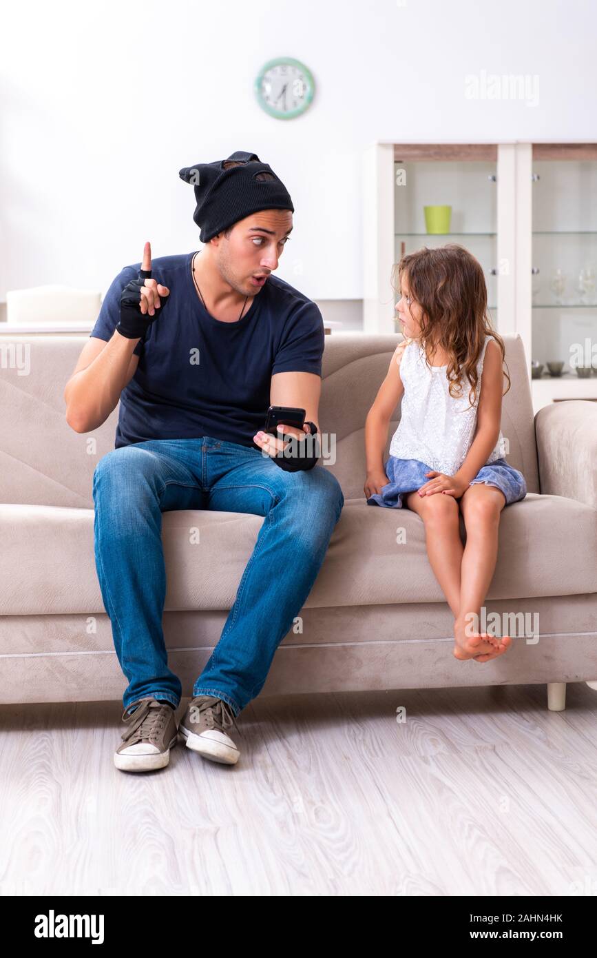 The child trafficking and abuse concept with small girl Stock Photo - Alamy