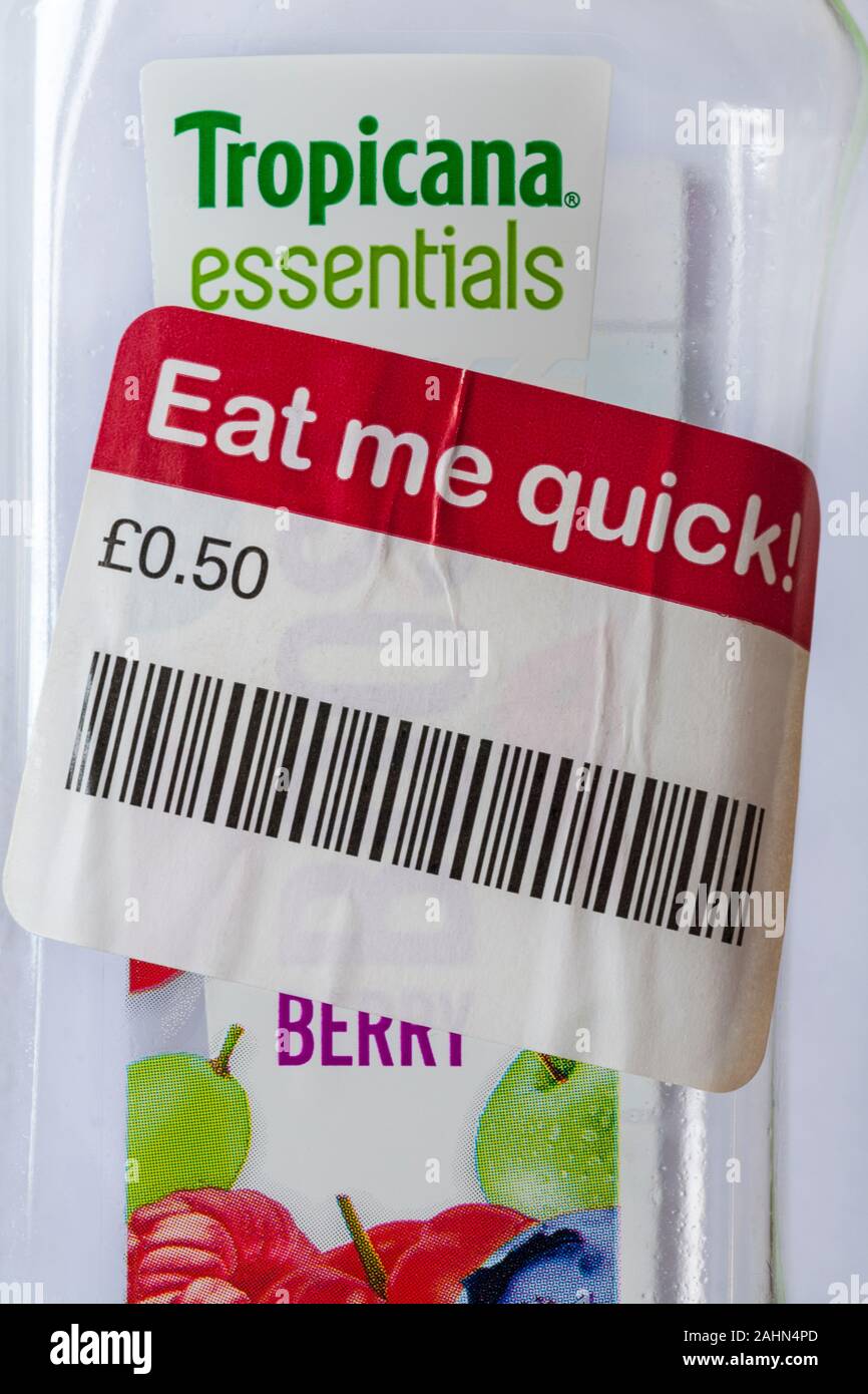 Eat me quick label on bottle of Tropicana essentials Berry Boost juice  drink with acerola cherry raspberry blueberry - reduced short shelf life  Stock Photo - Alamy