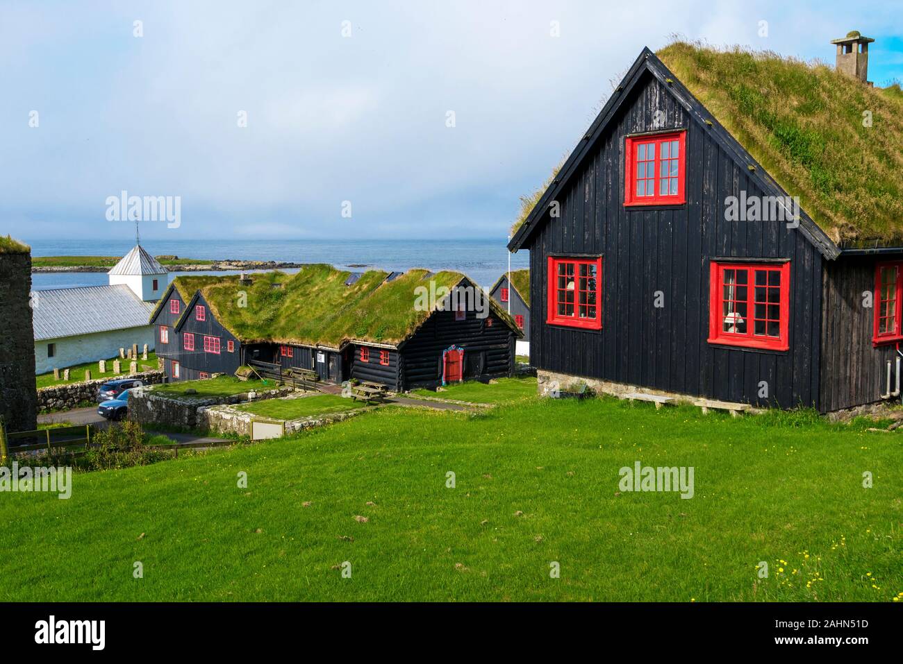 Traditional Faroese wooden houses in Kirkjubour Village, Faroese island of Streymoy Stock Photo