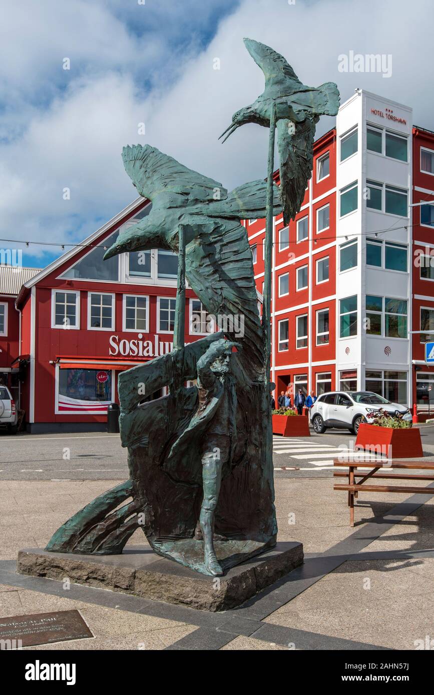 Torshavn, Faroe – July 11, 2018  Trappan place in Torshavn cily center, the monument in the center and the hotel building is at background Stock Photo