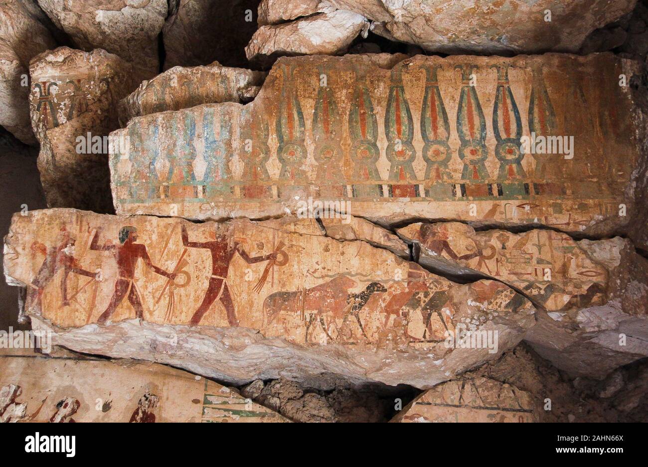Middle Egypt, Deir el Bersha, the tomb of Djehutyhotep dates from the Middle Kingdom. Main room, destroyed wall, sheperds lead their animals. Stock Photo