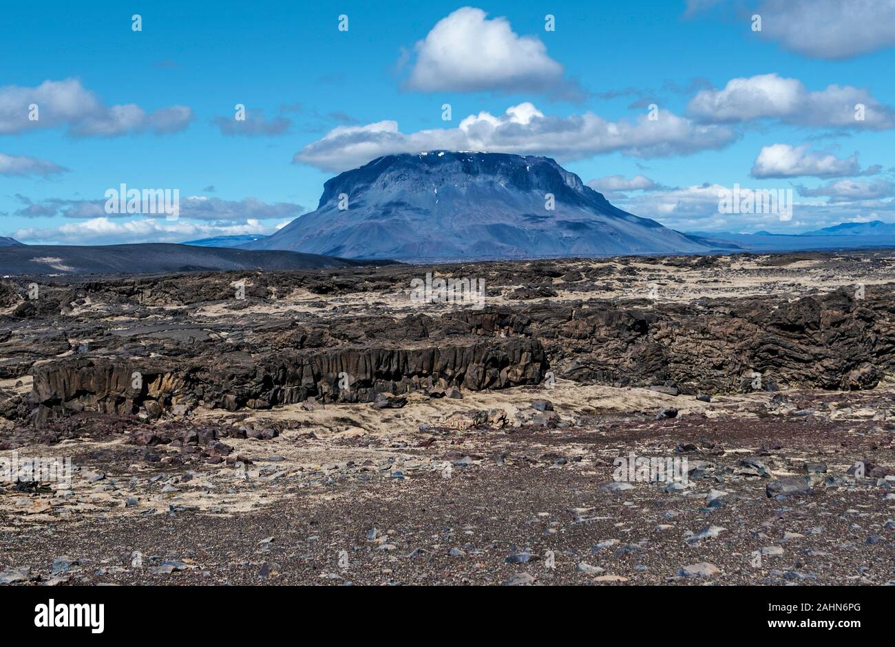 Herdubreid volcano mountain viewed from east and lava formations of Odadahraun desert are at foreground, Central Highlands of Iceland Stock Photo