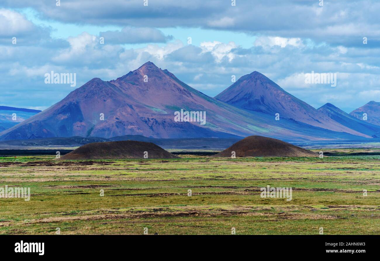 Modrudalsjallgardar mountains as viewed from Modrudalur farm. Central Highlands of Iceland, Austurland, Fljotsdalsherad Stock Photo