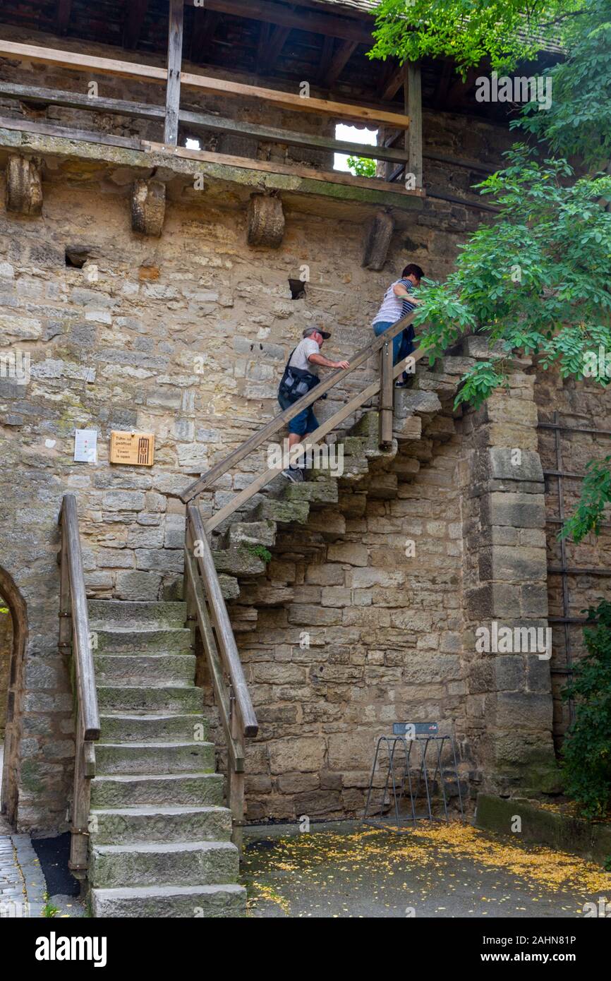 Wooden stairs leading up to part of the city wall in Rothenburg ob der Tauber, Bavaria, Germany. Stock Photo