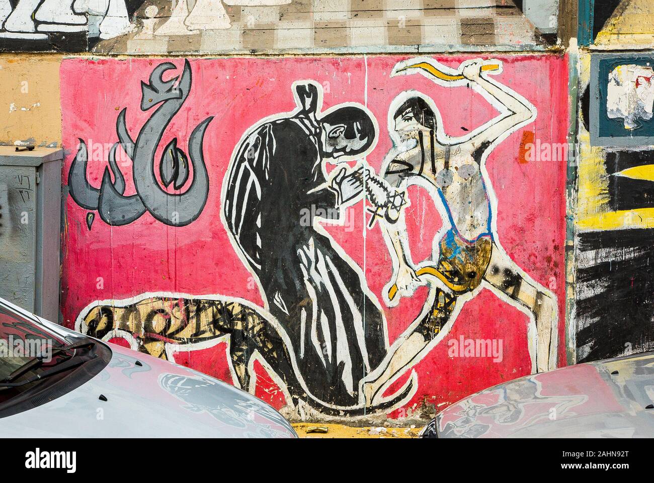 Egypt, Cairo, graffiti of the Egyptian revolution. Bottom of a big scene called 'the ruler and freedom'. Stock Photo