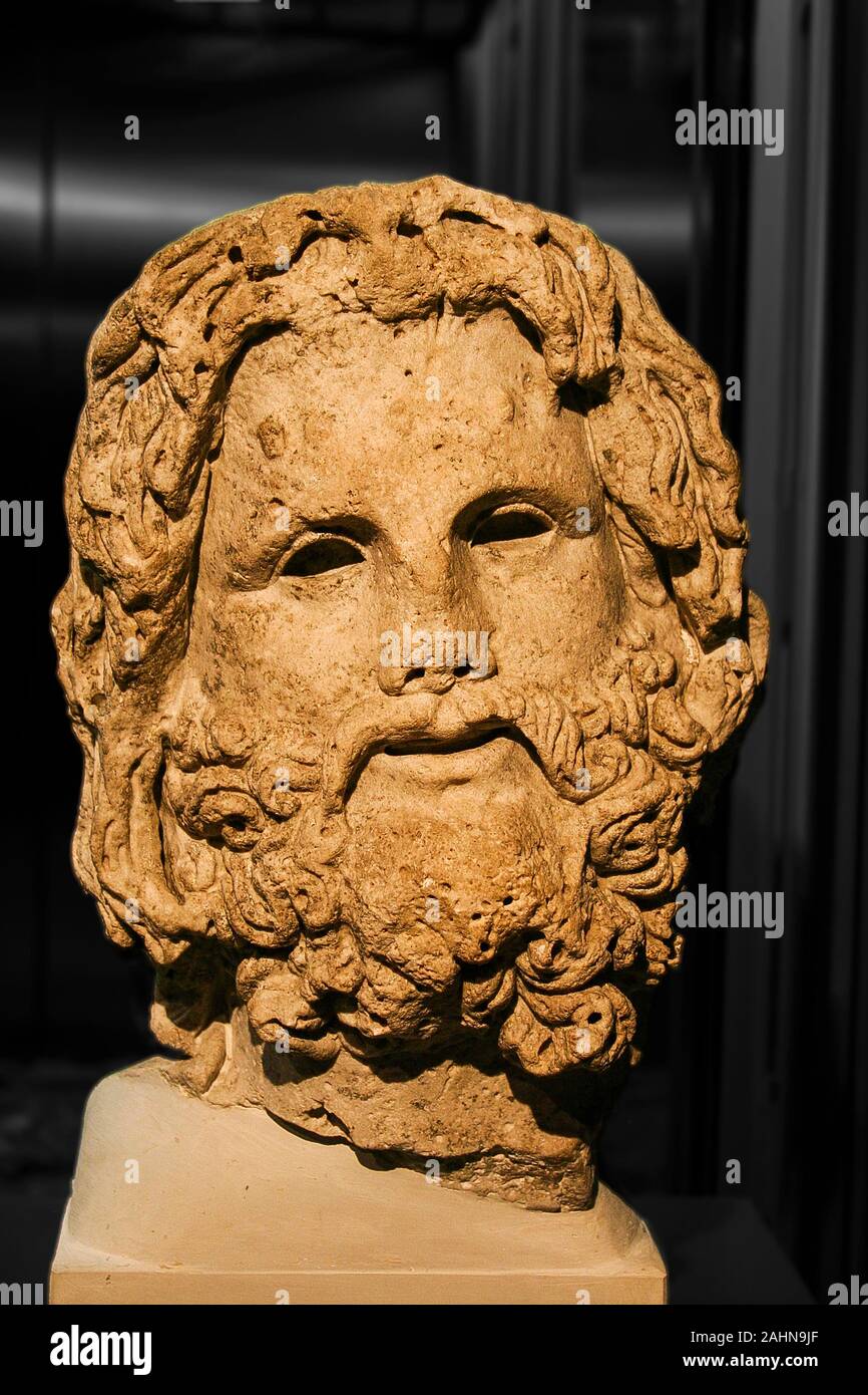Egypt, Alexandria, Archeological museum of the Bibliotheca Alexandrina, head of the god Serapis, with his typical curly hair and beard. Stock Photo