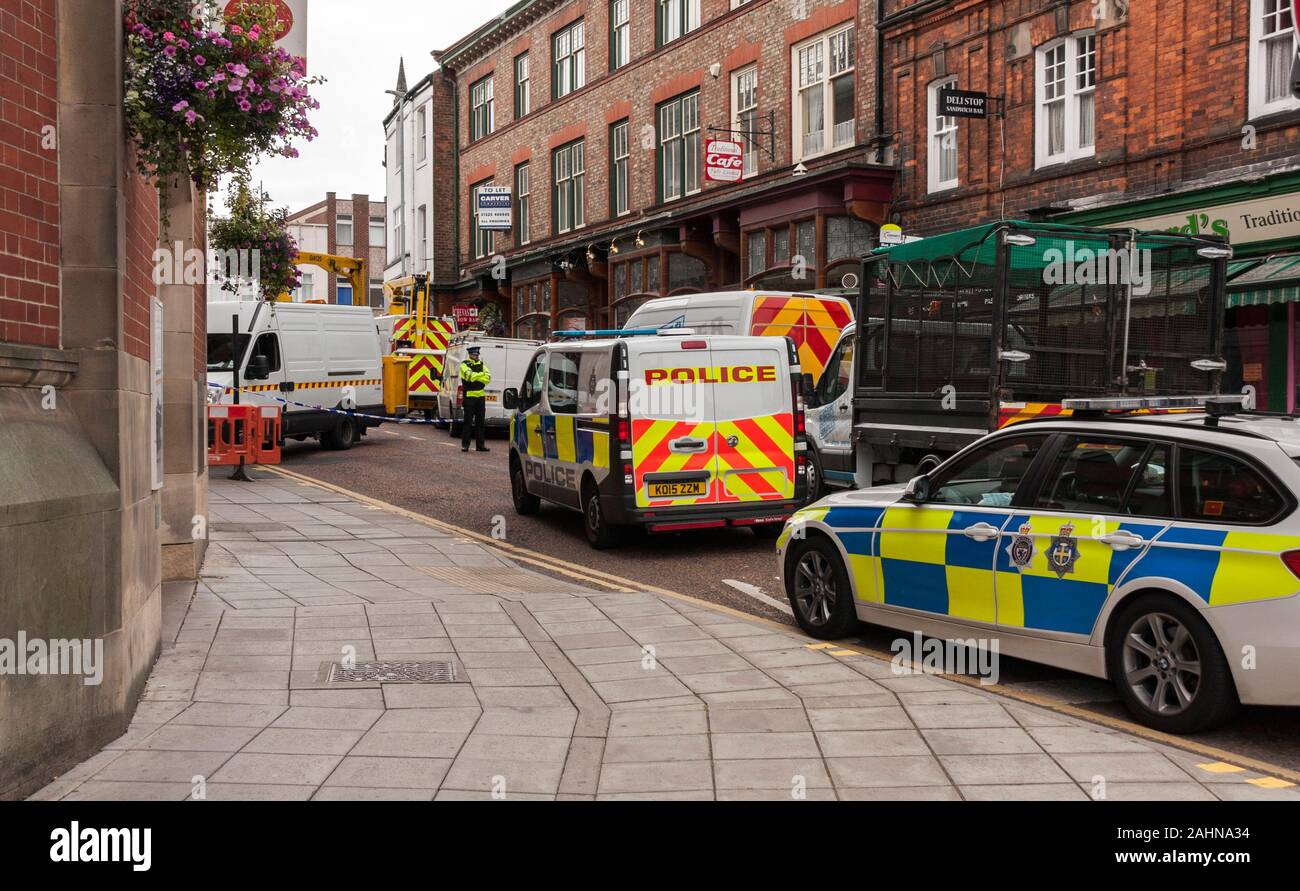 Police cordon off Northgate from traffic and pedestrians whilst enquiries ongoing into a fatal accident at the Halifax Bank,Darlington,England,UK Stock Photo