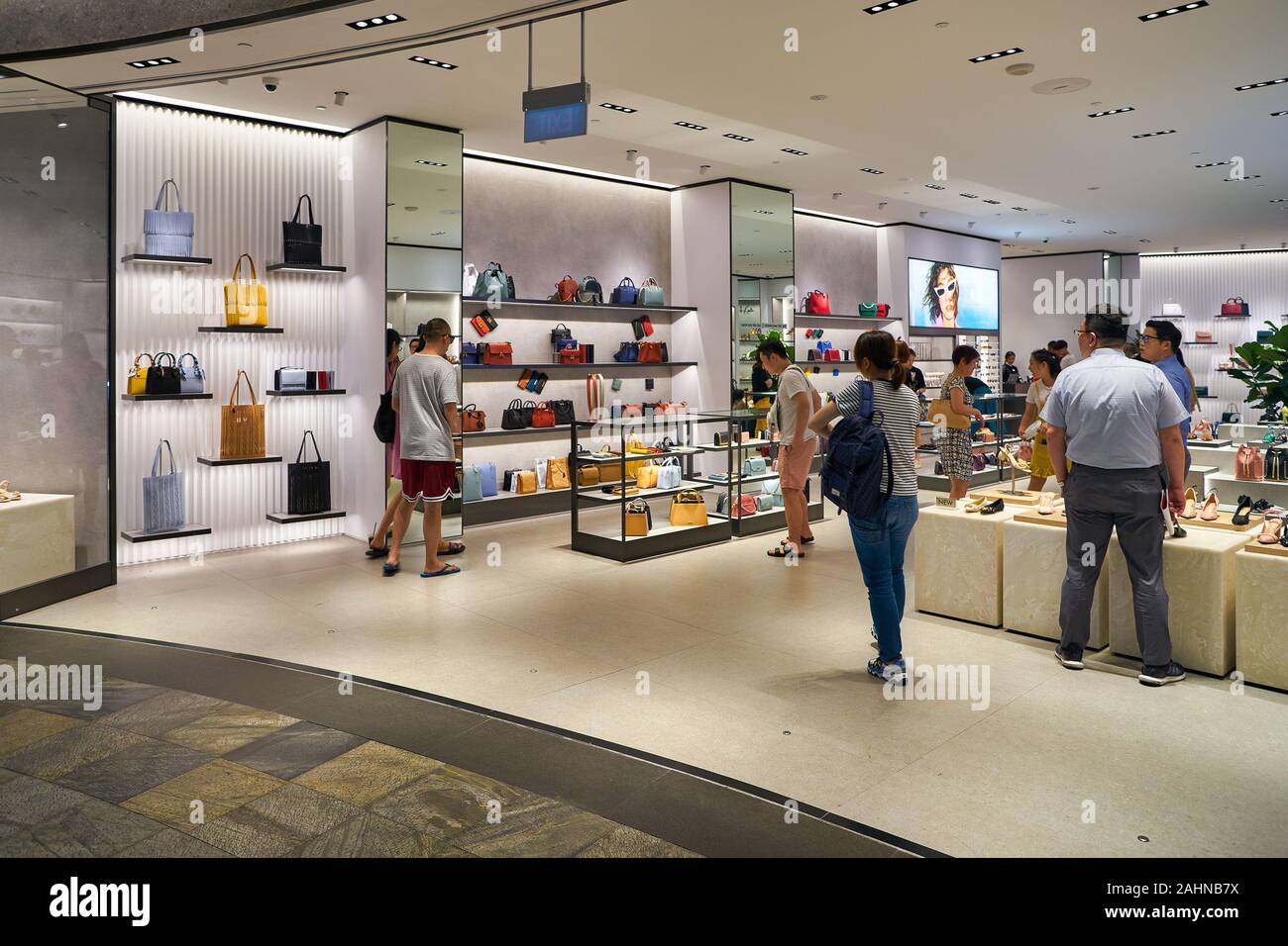 SINGAPORE - CIRCA APRIL, 2019: people at Charles & Keith store in The  Shoppes at Marina Bay Sands. CHARLES & KEITH is a Singaporean fast-fashion  footw Stock Photo - Alamy