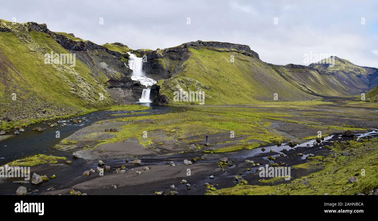 Panoramic view of Eldgja Canyon floor with the flow of Nordari-Ofaera river and Ofaerufoss waterfall in southern highlands of Iceland. The west of Vat Stock Photo