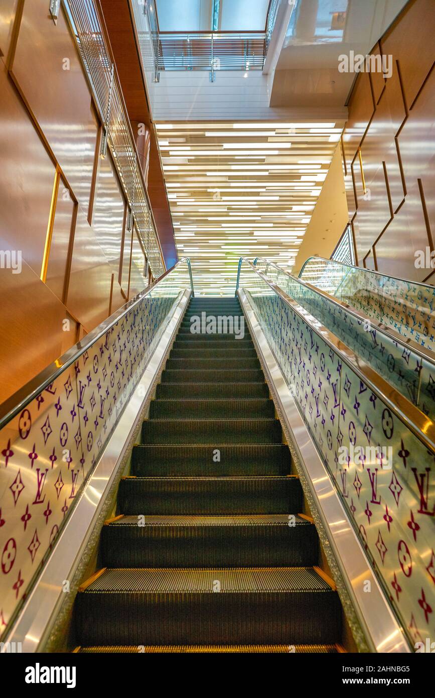 SINGAPORE - CIRCA APRIL, 2019: an escalator at Vuitton store in the Shoppes at Marina Bay Sands Stock Photo - Alamy