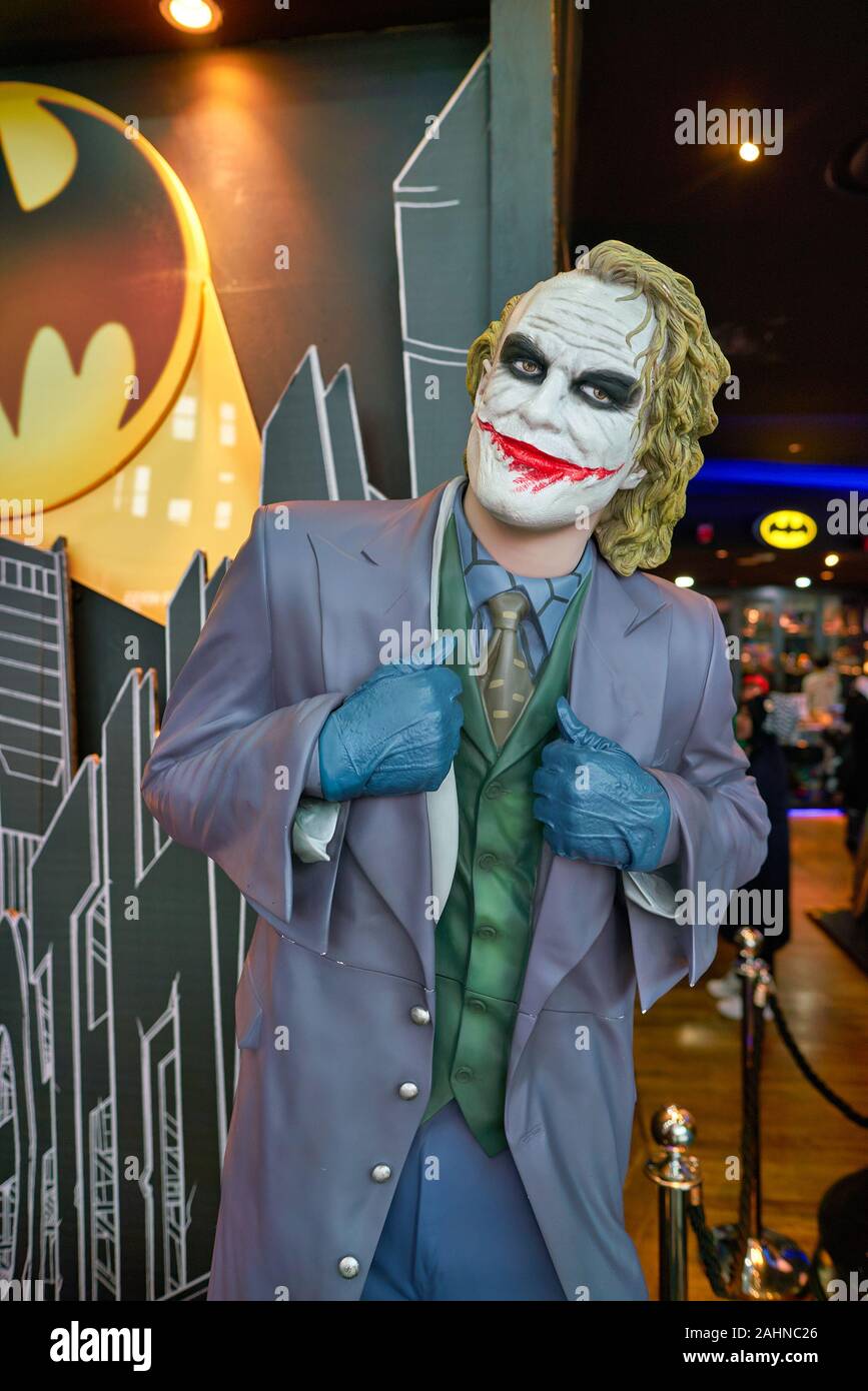 SINGAPORE - CIRCA APRIL, 2019: The Joker life-size statue on display at DC Comics Super Heroes Cafe at the Shoppes at Marina Bay Sands in Singapore. Stock Photo