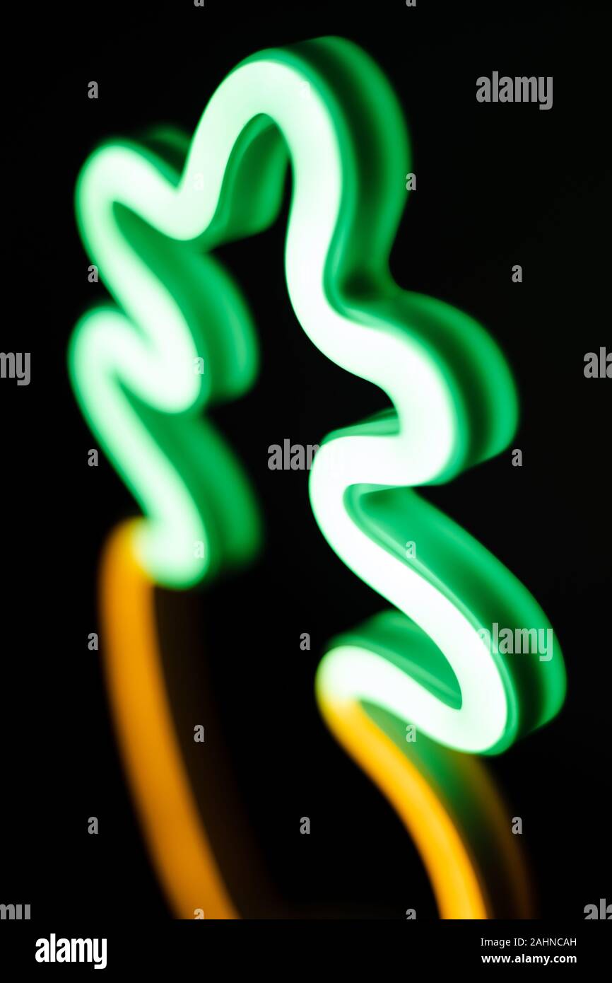 pineapple led neon light in dark room Stock Photo