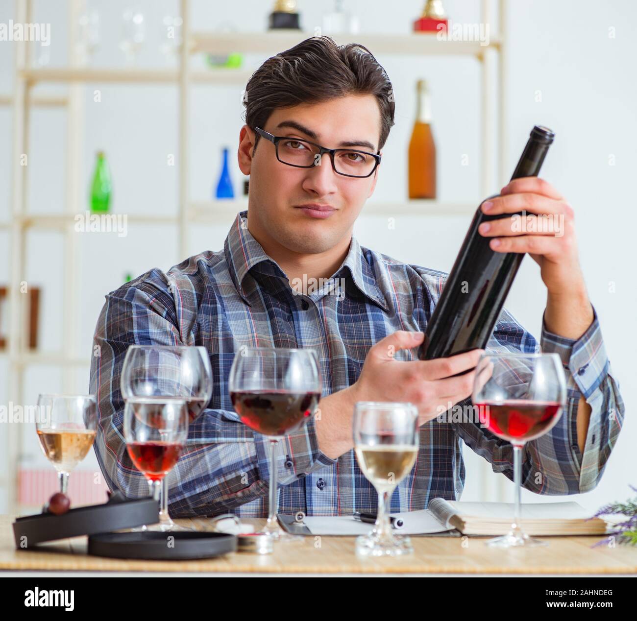 The professional sommelier tasting red wine Stock Photo Alamy