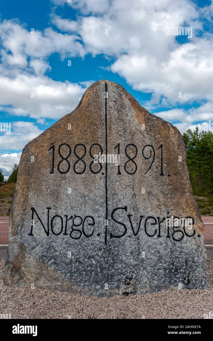 The stone marking the border between Norway and Sweden. Norwegian Hedmark is at left and Swedish Dalarna county is at right. Stock Photo
