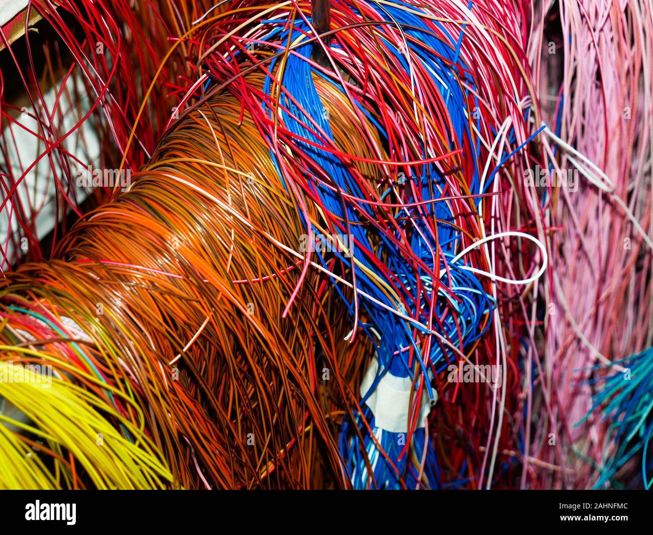 Wien/Austria - june 4 2019: pile of colorful electrical wires used in computers and other appliances sorted on a recycling and recovery compound in vi Stock Photo