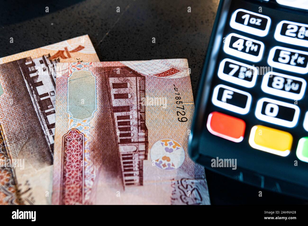 Bahraini Riyal Note Credit Card Machine with Bahrani Riyal notes Stock Photo - Alamy