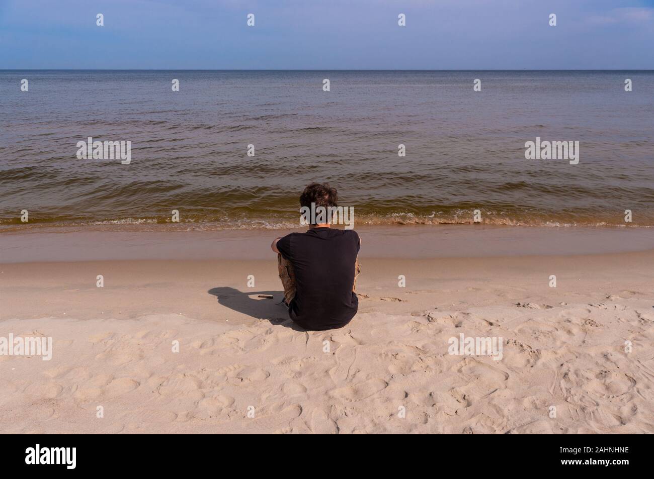 Lonely young man hi-res stock photography and images - Alamy