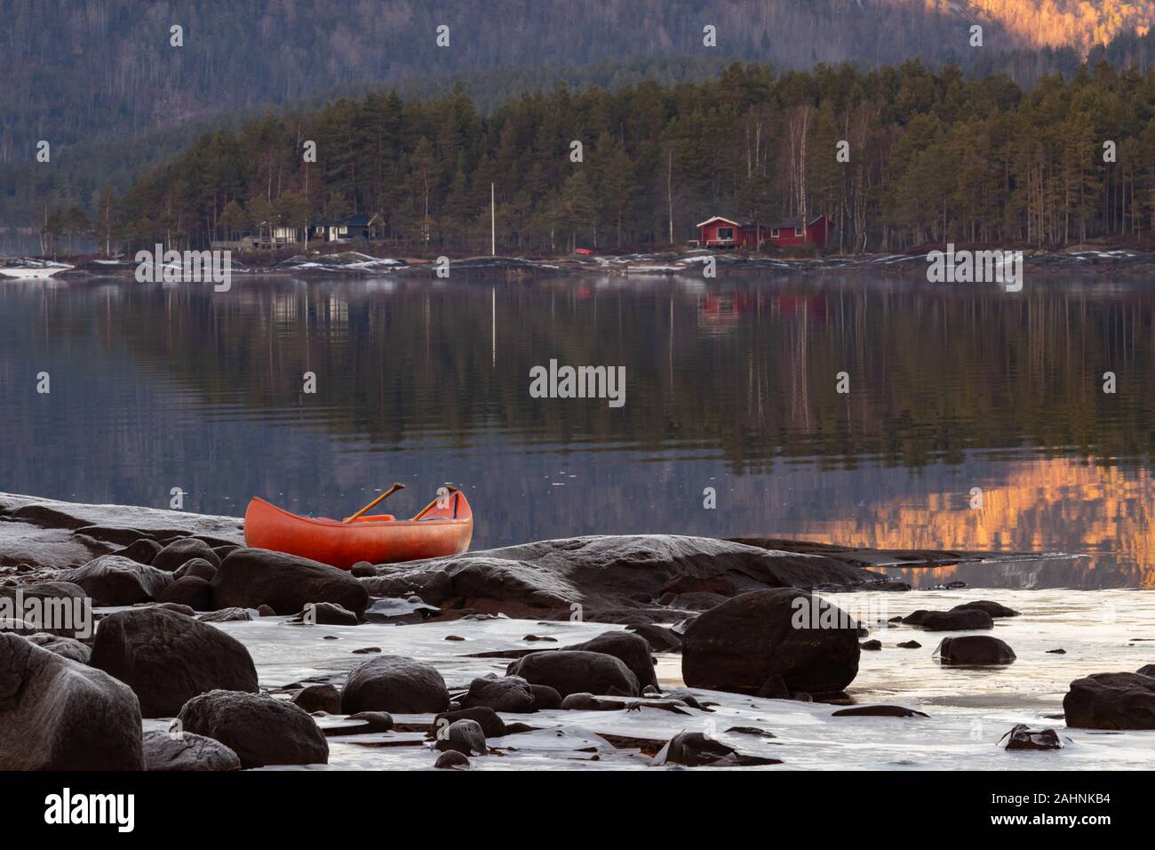 Winter Icy Retreat In A Norway Fjord With A Canoe And On Island