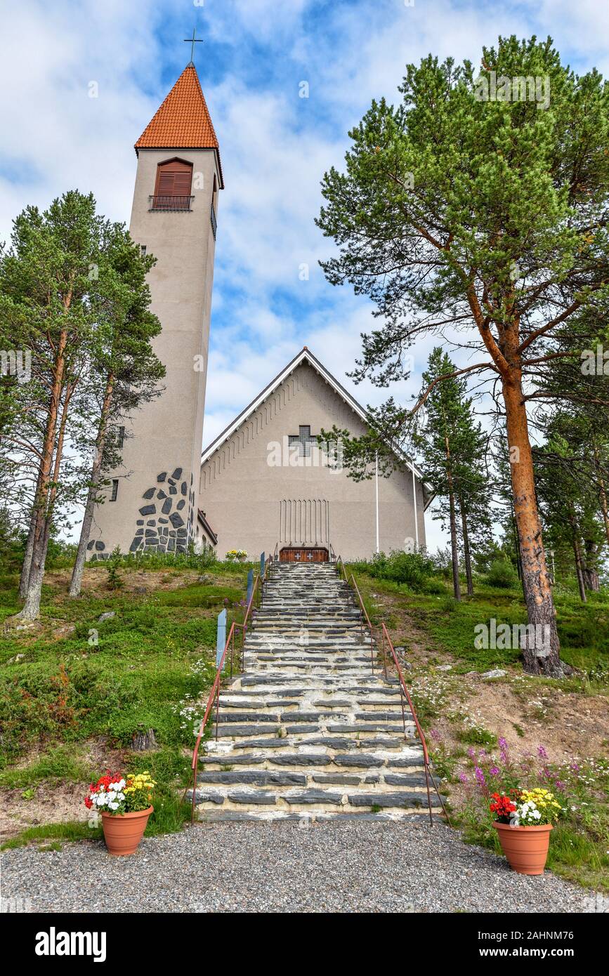 Enontekio church in Hetta village in Finnish Lapland. Walk steps to the main entrance are at foreground. Stock Photo