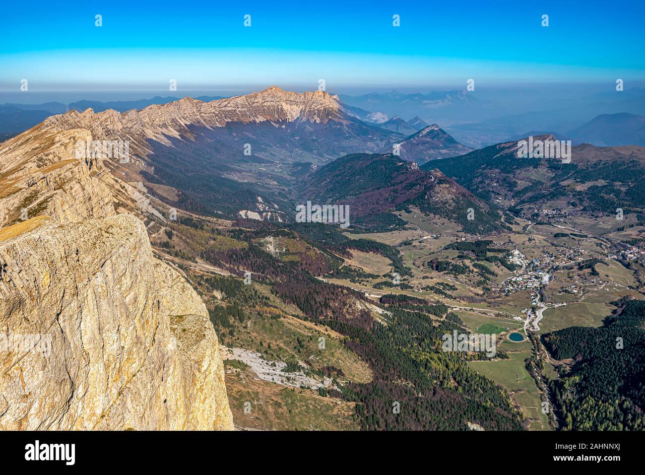 Ridges of Vercors as seen from Grand Veymont mountain summit, dominating the valley of Vercors Regional Natural Park and Gresse-en-Vercors village. Au Stock Photo