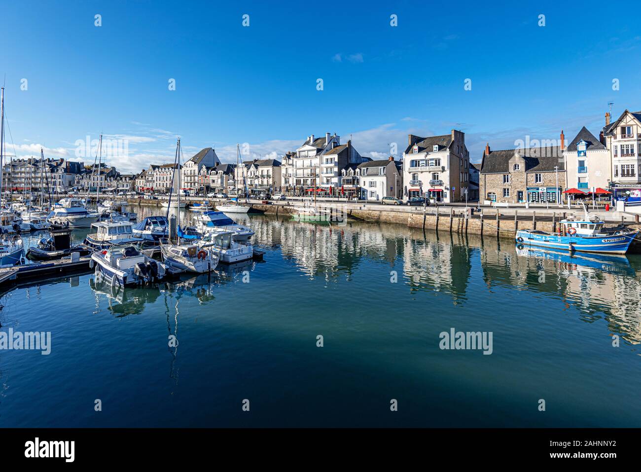 La Baule-Escoublac, France – November 1, 2018  View of  Lules Sandeau Quay and boats moored in the port of Le Pouliguen Channel in La Baule, the seasi Stock Photo