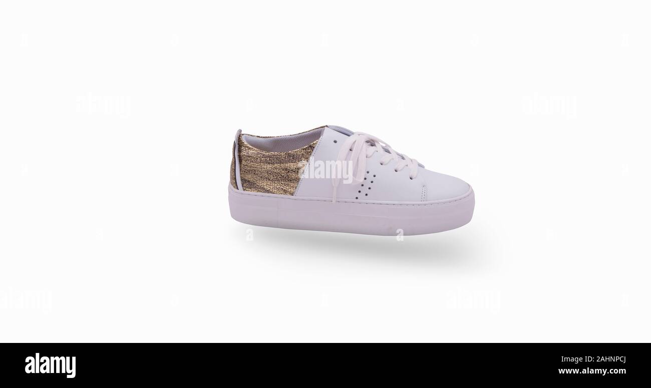 Women single sneaker isolated on white background with clipping path Stock Photo